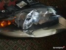 Reflektor Audi a4 B7 - 4