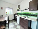 Dom z 4 apartamentami na działce 1140 m2 - 12