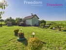 Urokliwy domek całoroczny z dużą działką. - 1