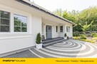 Rancho pod miastem z domem w stylu Hampton. - 2