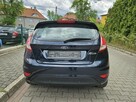 Ford Fiesta Podgrzewane fotele / Klimatyzacja / Czujniki parkowania - 5