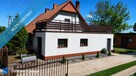 Dom z charakterem w klimatycznym stylu wiejsko-nowoczesnym - 8