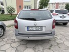 Renault Laguna II 1.9 DCI 114 KM z 2006 r. - 6