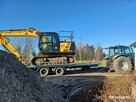 Tridem Trailor przyczepa niskopodwoziowa z najazdami hydr.
