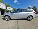 Ford Focus Klimatyzacja, Podgrzewana szyba czołowa, 2 kpl. kół, Bi-Xenon - 7