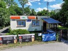 Kołaczków pawilon handlowy z częścią mieszkalną.