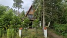 Domek letniskowy w lesie nad jeziorem z sauną