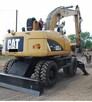 KOPARKA PRZEŁADUNKOWA CAT M313D - 4