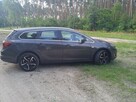 Sprzedam Opla Astrę J po lifcie Sports tourer 2013 r - 1