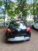 Sprzedam samochód osobowy mazda 2 - 4