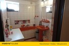Przedmiotem ogłoszenia jest 12-pokojowy dom. - 12