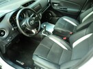 sprzedam TOYOTE YARIS hybryde 1.5 wersja GR alkantar,skóra - 10
