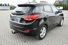 Hyundai ix35 1,6benz DUDKI11  Skóry,Navi.Kam.Przód Tył.Tempomat.Podg.Fot.Przód i T. - 9