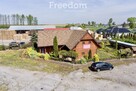 Działka zabudowana budynkiem drewnianym - 11