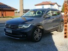 Volkswagen Tiguan - 1