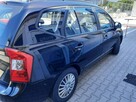 Kia Carens - 2