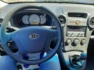 Kia Carens - 4