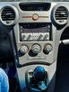 Kia Carens - 8