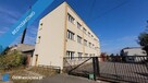 Działka zabudowana budynkami produkcyjno- magazynowymi - 1