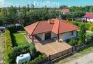 Parterowy dom z ogrodem i garażem 112,6 m² - 1