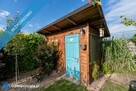 Dom, który pozwala zwolnić tempo – 2100 m² prywatności | Fotowoltaika | Sauna | Balia | 2 garaże - 16