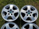Felgi Skoda 14 5x100 6J ET43 6Y0-025 Fabia komplet 57,1mm - 4