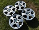 Felgi Skoda 14 5x100 6J ET43 6Y0-025 Fabia komplet 57,1mm - 2