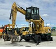 KOPARKA PRZEŁADUNKOWA CAT M313D