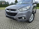 Hyundai ix35 1,6 Benzyna Skóry.Serwis.Klimatronic 2 str.Tempomat.Parktronic.Hak - 8