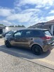 Kia Carens - 2