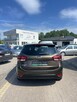 Kia Carens - 4