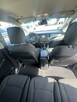 Kia Carens - 11
