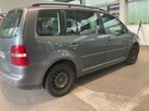 Volkswagen Touran 1,9 TDI, 7 miejsc,ESP,CLIMAtronic OK,podg. fotele, parktronik, zarej. - 2