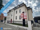 Działka zabudowana budynkiem biurowym - 1