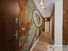 Dwupoziomowy apartament w niespotykanym stylu - 6