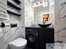 Dwupoziomowy apartament w niespotykanym stylu - 11