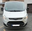 Przewóz osób samochodem 9 osobowym Ford Transit. - 1