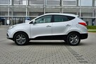 Hyundai ix35 LiFT_2,0CRDi_136Km_Ledy_Duża_Navi_Kamera_Skóra_Grzana_Klimatronik_ - 14
