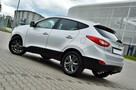 Hyundai ix35 LiFT_2,0CRDi_136Km_Ledy_Duża_Navi_Kamera_Skóra_Grzana_Klimatronik_ - 15