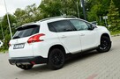 Peugeot 2008 1,6_Benzyna_120Km_Panorama_Ledy_Alcantara_Navi_Grip_Control_Full_Opcja - 15