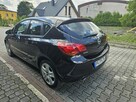 Opel Astra Klimatyzacja / Podgrzewane fotele i kierownica / Tempomat - 6