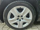 Opel Astra Klimatyzacja / Podgrzewane fotele i kierownica / Tempomat - 16
