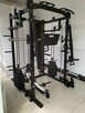 Atlas do ćwiczeń suwnica Smitha half rack klatka - 3