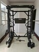 Atlas do ćwiczeń suwnica Smitha half rack klatka - 4