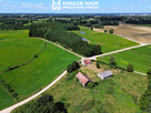 Dom z działką 6228 m² i zabudowaniami gospodarczym