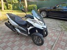 Motocykl guadro tròjkołowiec