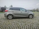 Kia Carens - 4