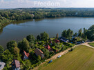 Dom w pierwszej linii zabudowy jeziora. - 2