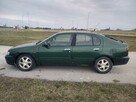 Nissan Primera P11 - 15