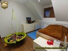 Komfortowy dom jednorodzinny z garażem i placem zabaw Szopin - 14